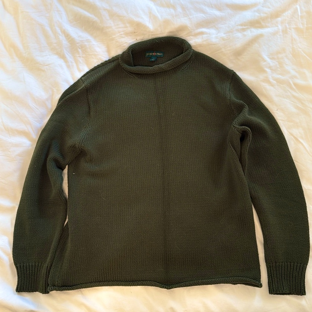 Green roll neck cable knit sweater